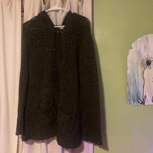 Long above knee sweater with a hood and large buttons